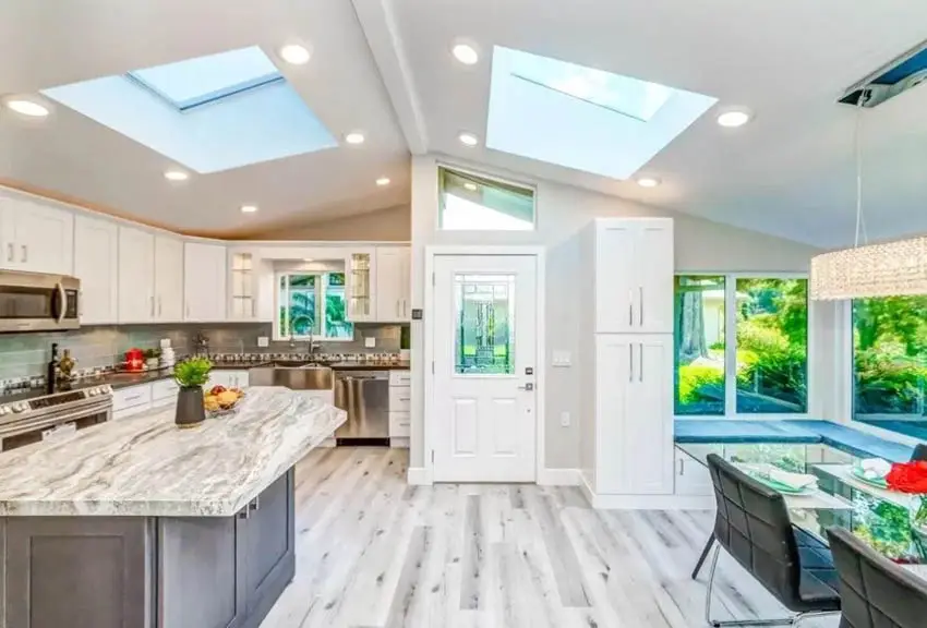 Kitchen and dining room with skylights