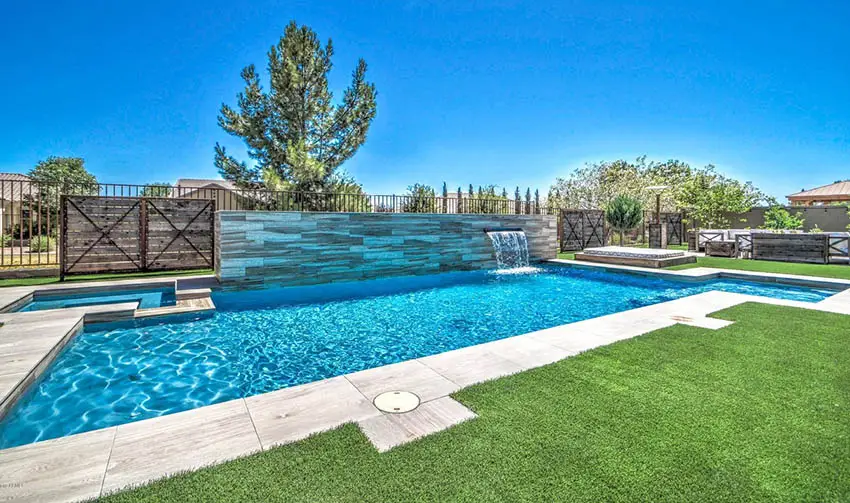 Swimming pool with artificial grass