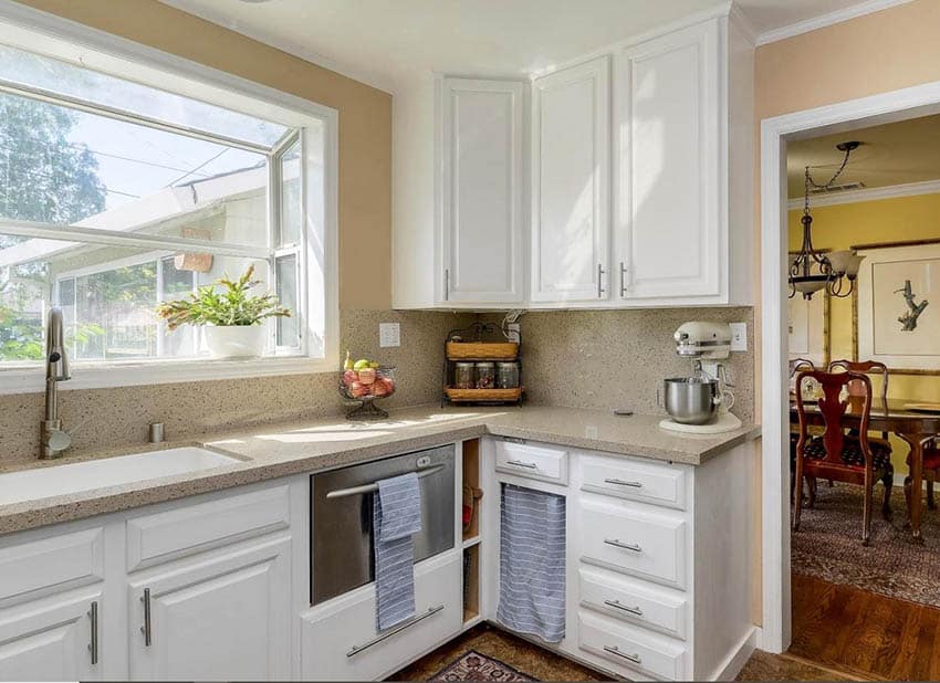 Traditional kitchen with garden window and potted plant