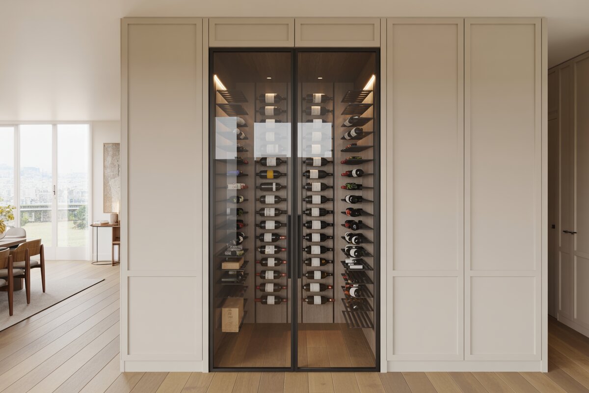 Black-framed glass wine closet set into a cream paneled dining wall