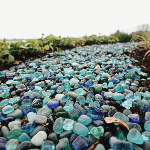 Tumbled recycled glass gravel in blue and green landscaping stones