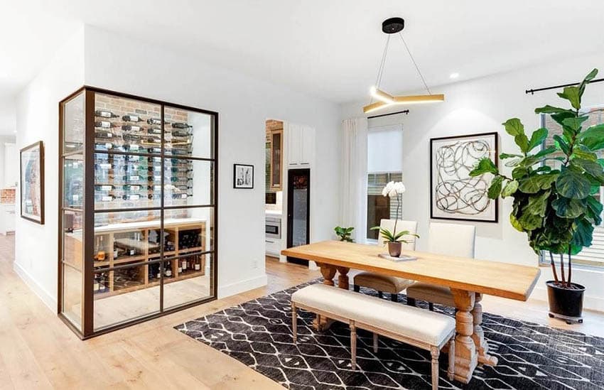 Contemporary dining room with wine closet