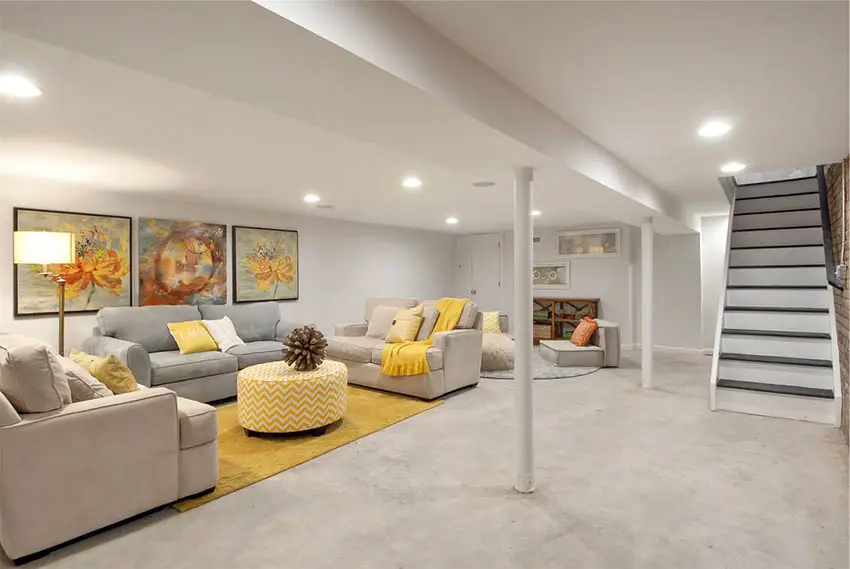 Contemporary Finished Basement With Concrete Flooring And Home Bar