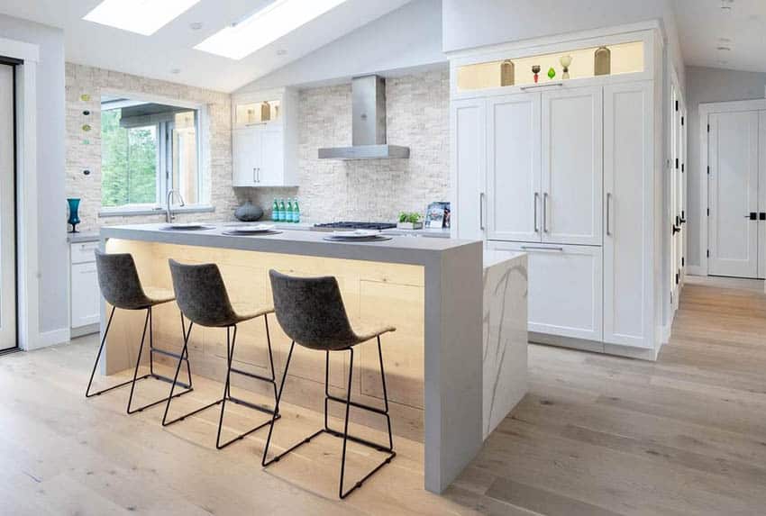 Contemporary kitchen with under island lighting cabinet niche lights