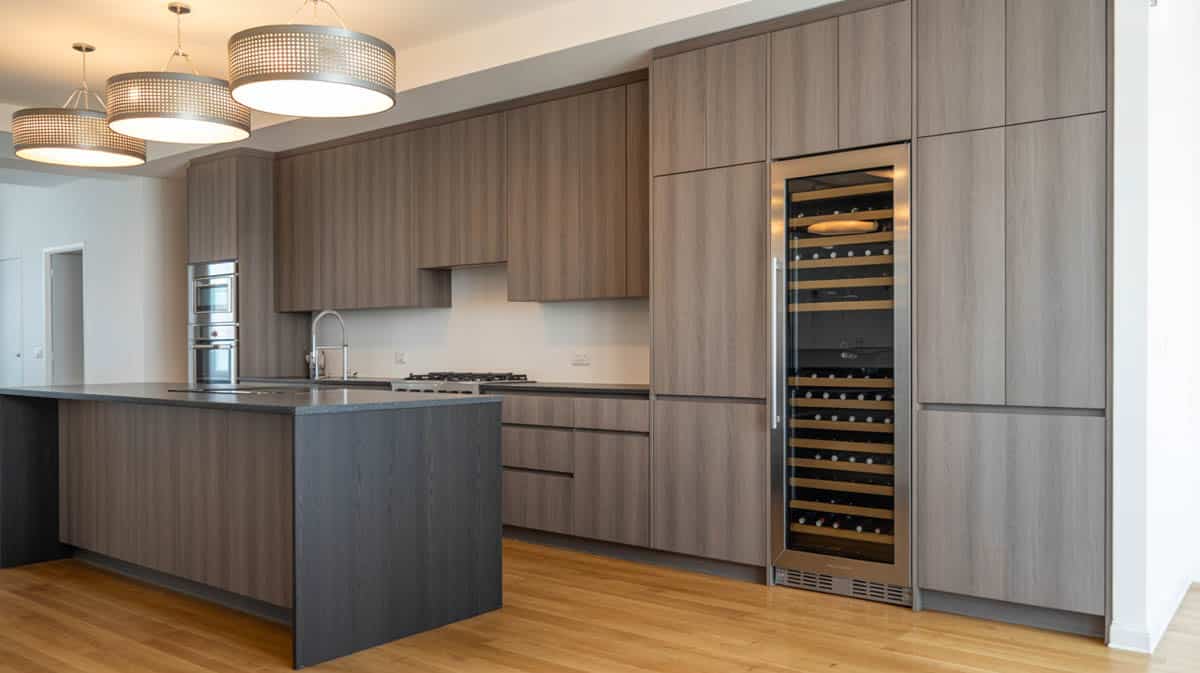 This contemporary kitchen combines textures and finishes to create more movement and