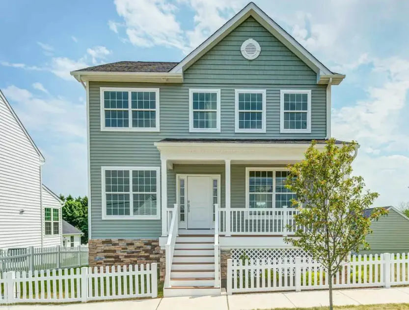 House With Picket Fence And Curb Appeal