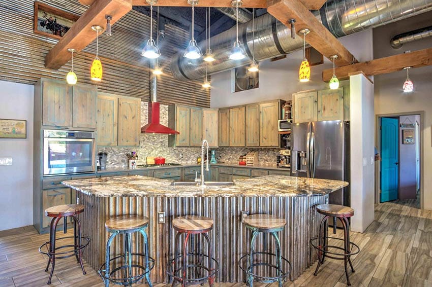 Industrial loft kitchen with corrugated galvanized steel island and wall distressed wood cabinets