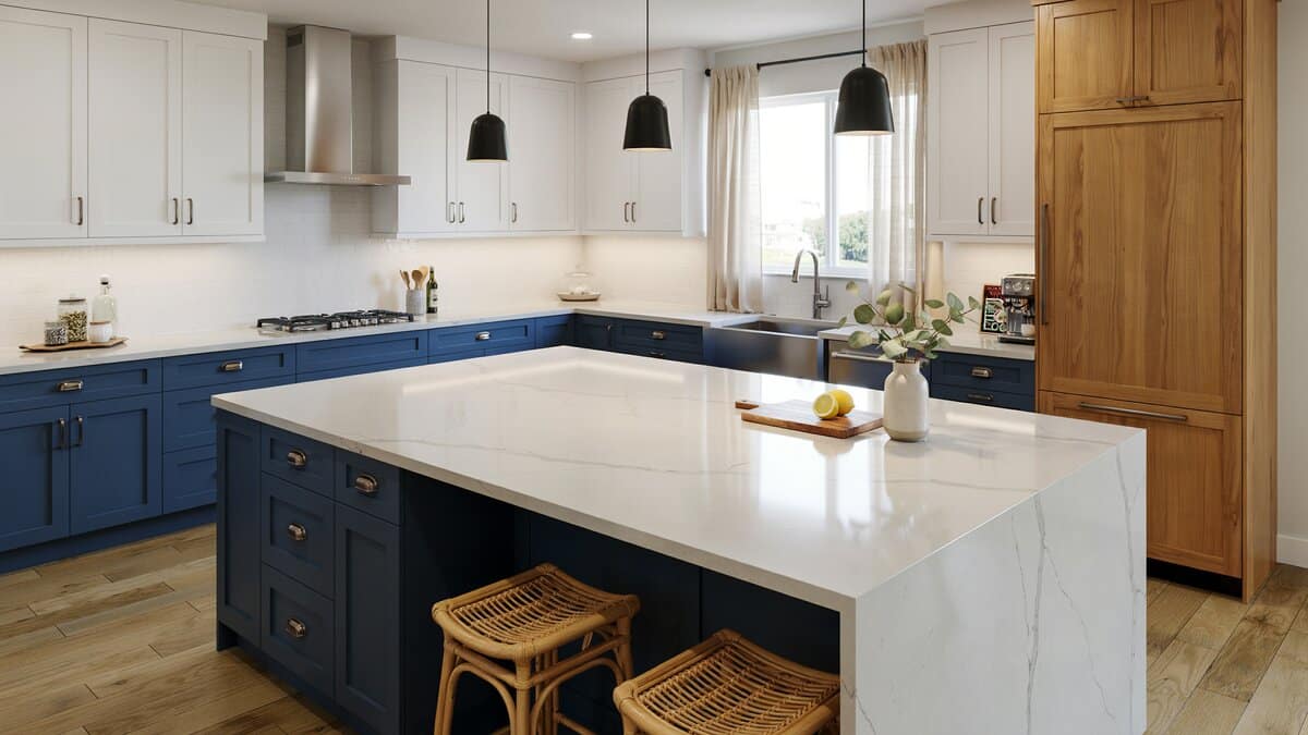 Kitchen mixing three cabinet colors topped with white quartz countertops