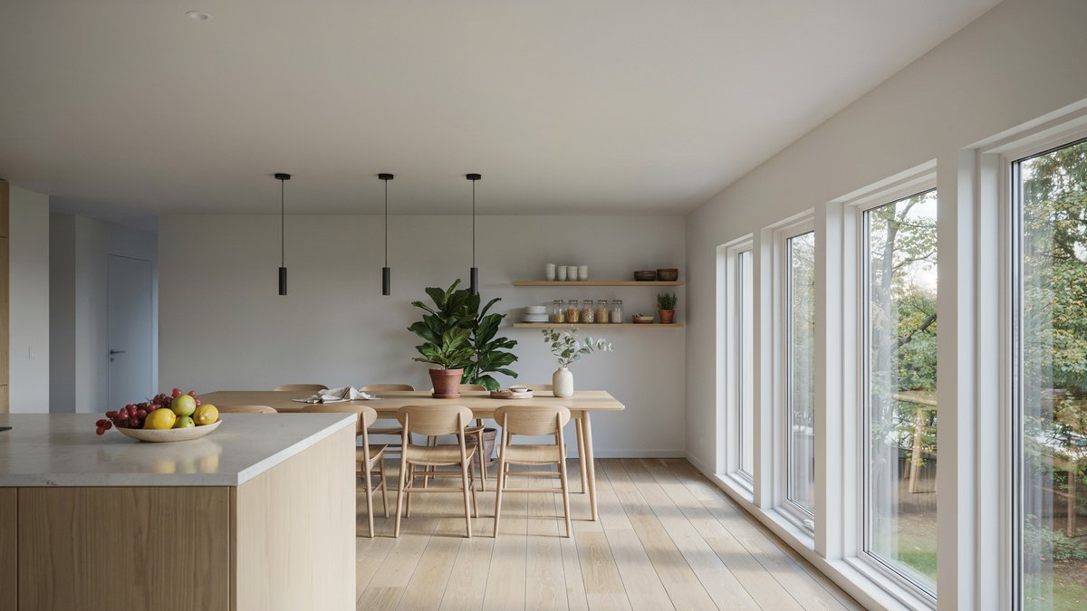 Open plan dining table with fiddle leaf fig and island fruit bowl