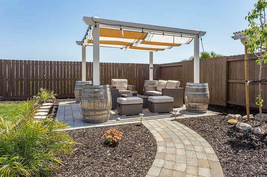 Paver walkway to patio with covered pergola