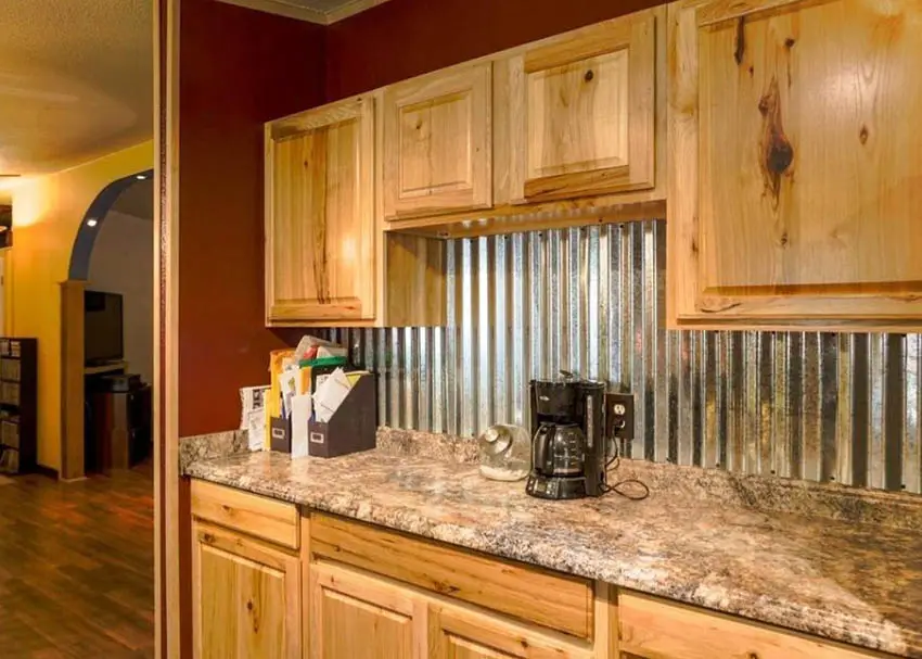 Rustic wood cabinet kitchen with corrugated galvanized steel backsplash