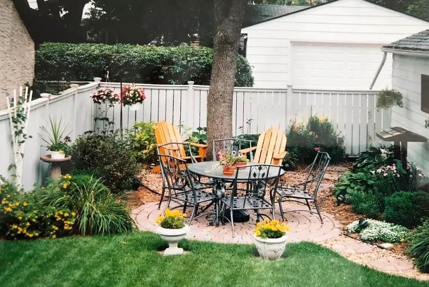 Small paver patio with outdoor dining table