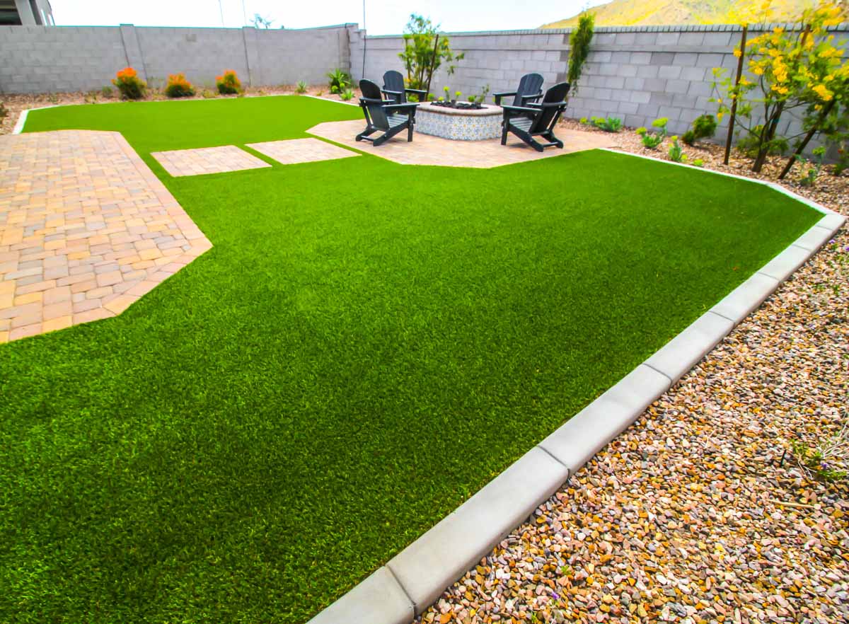 spacious yard with grass and gravel