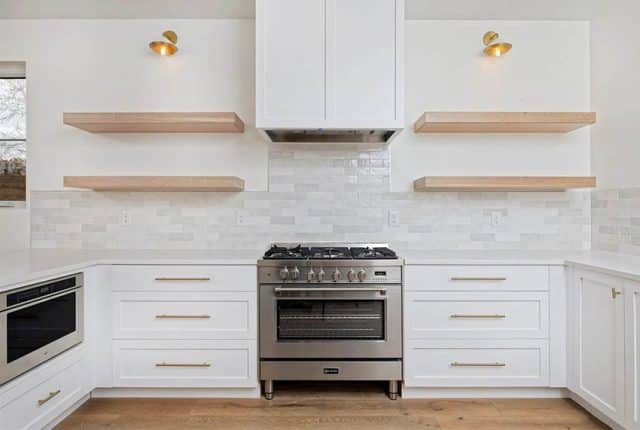 Top 5 Standard Stove Dimensions For Your Kitchen   U Shaped Kitchen With Center Stove White Cabinets White Quartz Countertops 640x430 