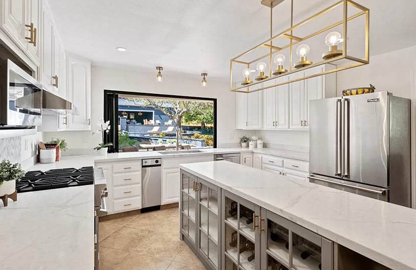 U-shaped kitchen with narrow island and wine storage