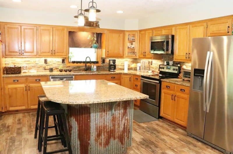 Corrugated Metal In Kitchens Design Gallery   Wood Cabinet Kitchen With Distressed Corrugated Metal Island 800x531 