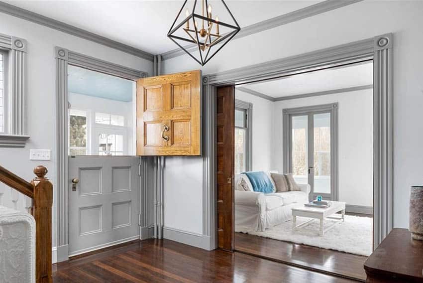 Dutch door with wood stain front and gray paint interior