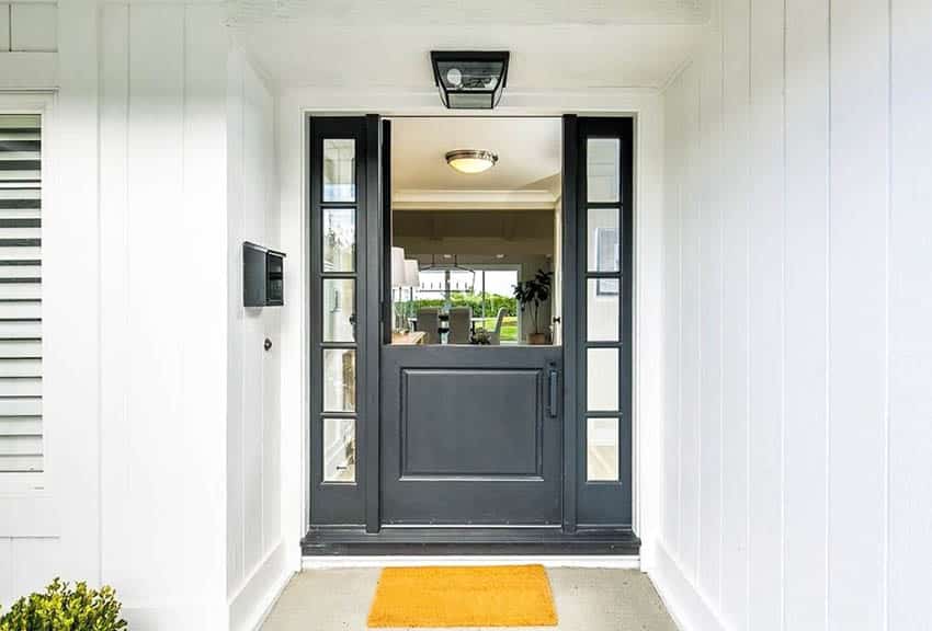 Gray dutch door with glass sidelights