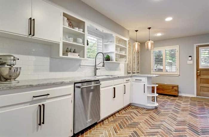 Herringbone pattern brick floor in kitchen