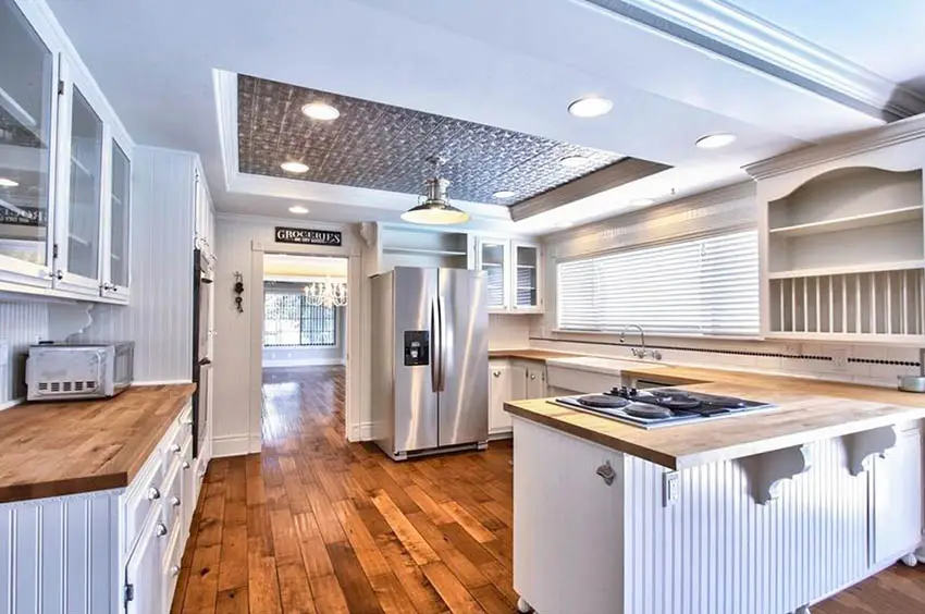 Kitchen with metal tray ceiling
