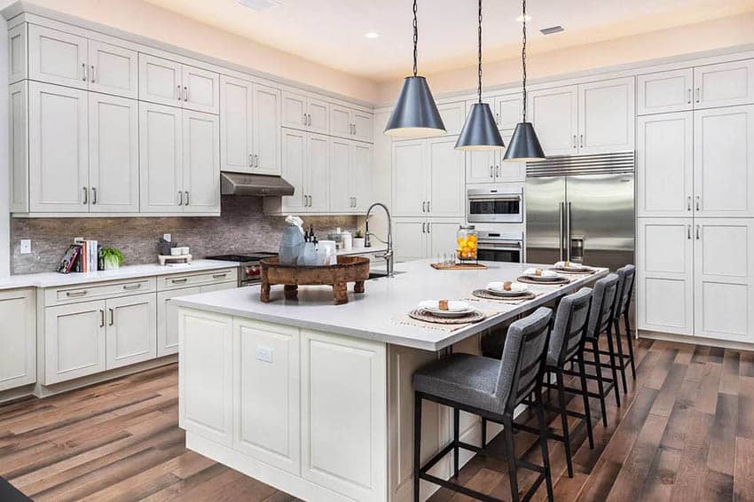 Large kitchen with dining island quartz countertops off-white color cabinets