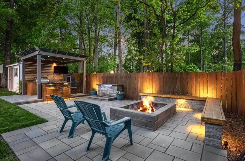 Modern concrete paver patio with entertaining center outdoor kitchen fire pit