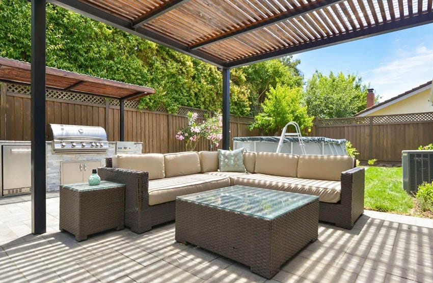 Modern pergola with narrow wood rafters and plastic cover for rain protections