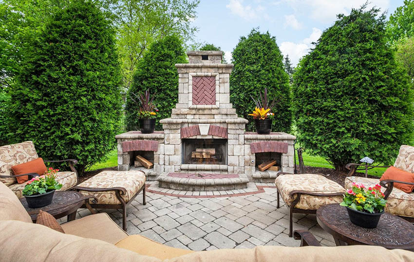 Paver patio with outdoor fireplace