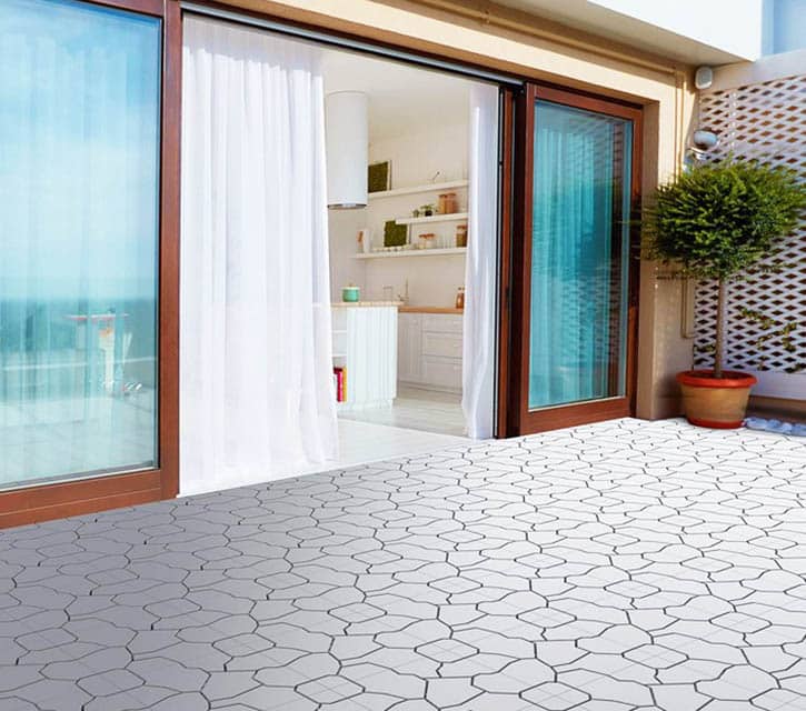 Patio with plastic tiles and sliding door