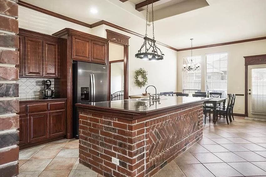 Rustic kitchen with custom brick island