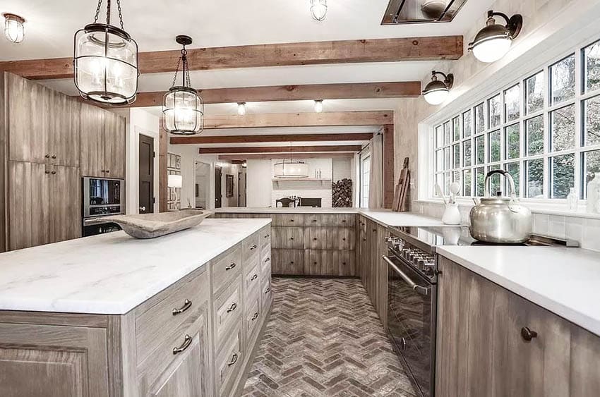 Rustic kitchen with wood cabinets and brick flooring
