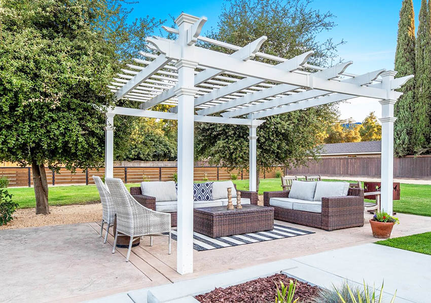 Traditional white pergola in backyard