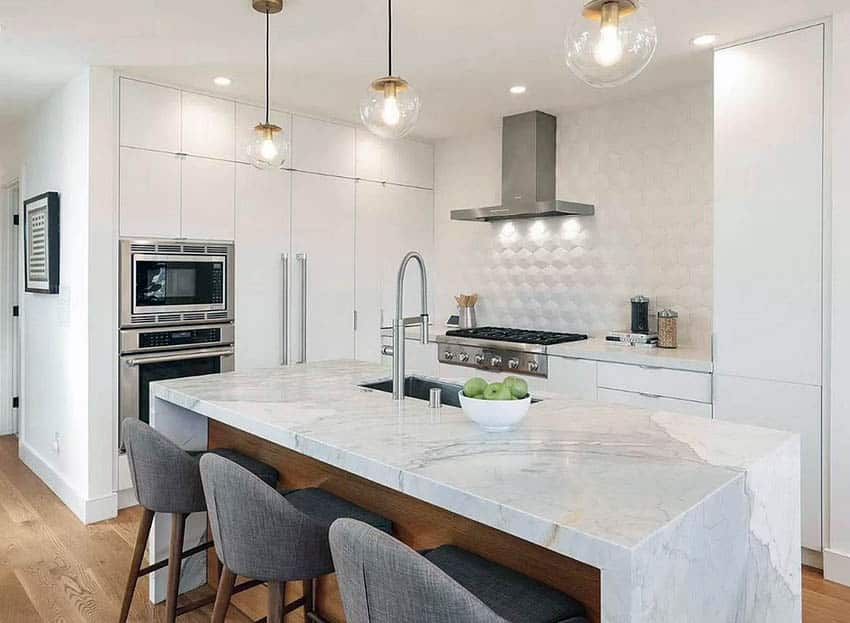 Transitional kitchen design with marble kitchen island pendant lights white cabinets