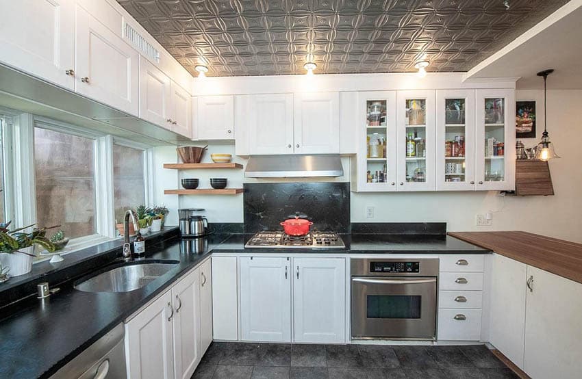 white-cabinet-kitchen-with-tin-ceiling-butcher-block-peninsula