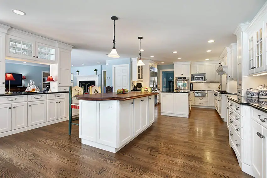 White shaker cabinet kitchen with two islands
