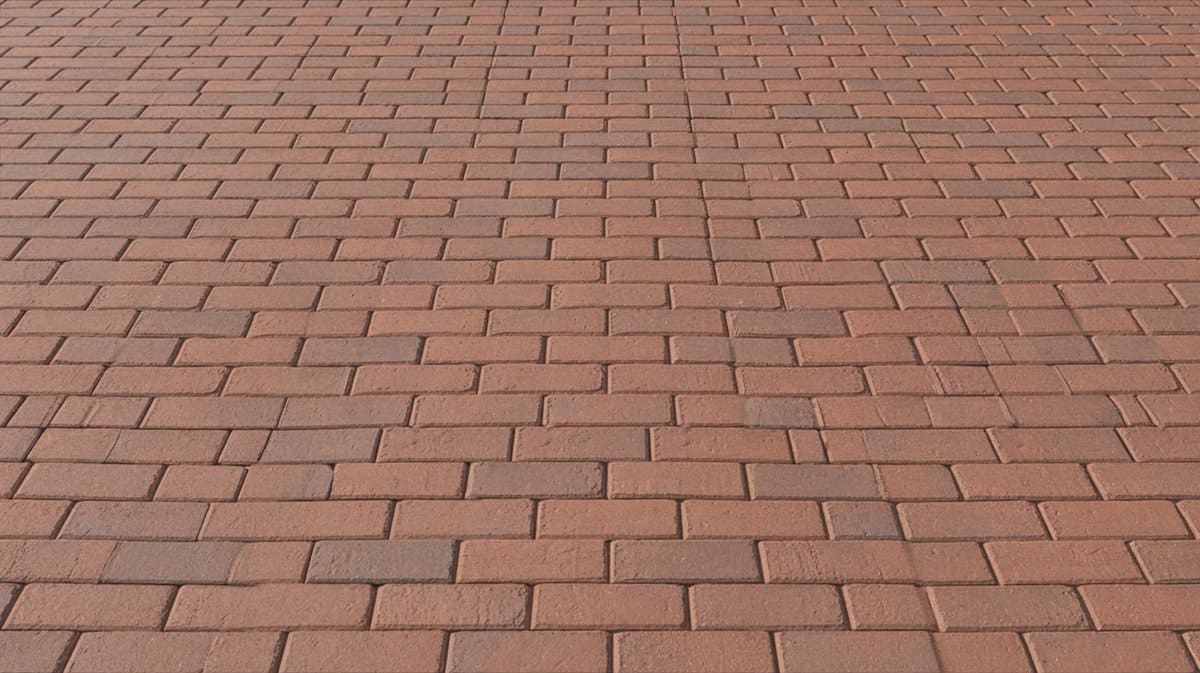 Close view of reddish brick pavers arranged in a tidy basketweave pattern