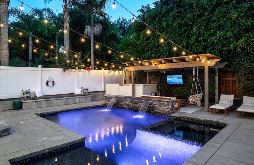 Backyard pool patio with pergola and outdoor tv