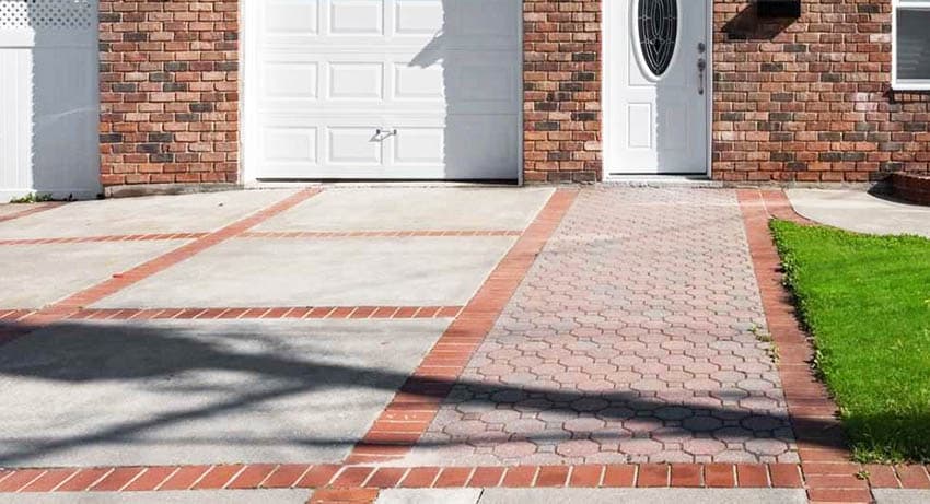 Driveway with brick and concrete paving materials