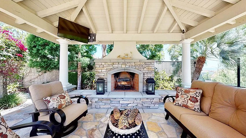 Pavilion with stone fireplace and flat screen