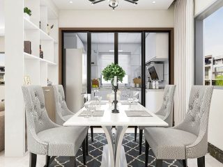Contempoary dining room with white table, gray chairs and black area rug