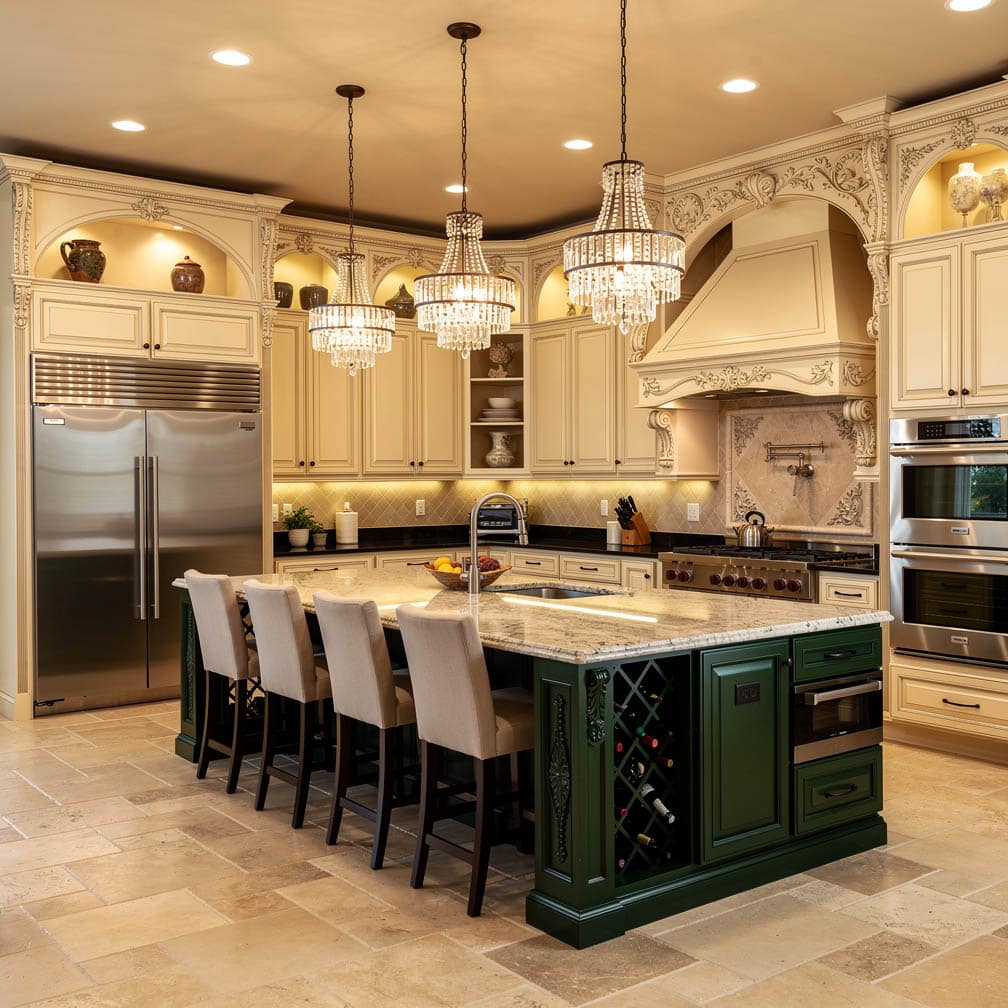 This kitchen features cream-colored cabinets with black iron handles. Cream