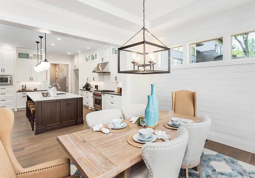 Dining room table layout next to kitchen