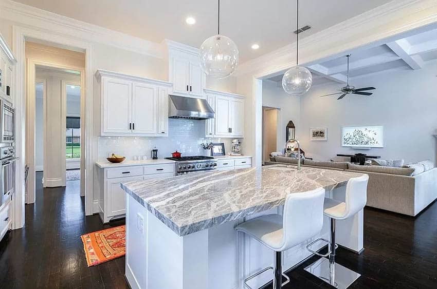 Kitchen with gray marble look silestone counters white cabinets