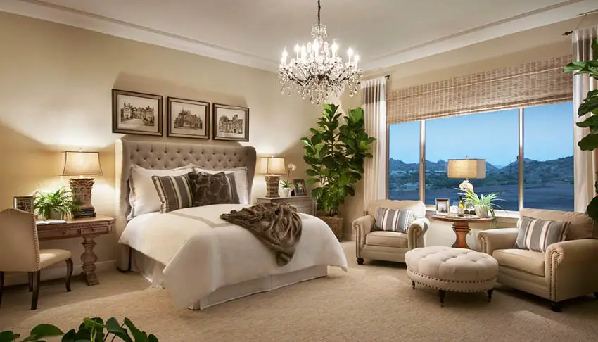 Master bedroom with sitting area and ottoman