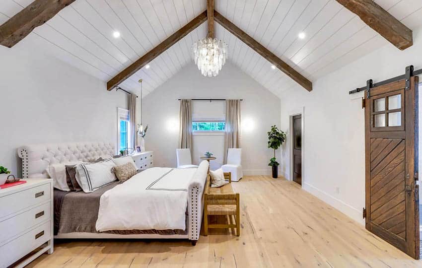 Modern farmhouse bedroom with shiplap cathedral ceiling