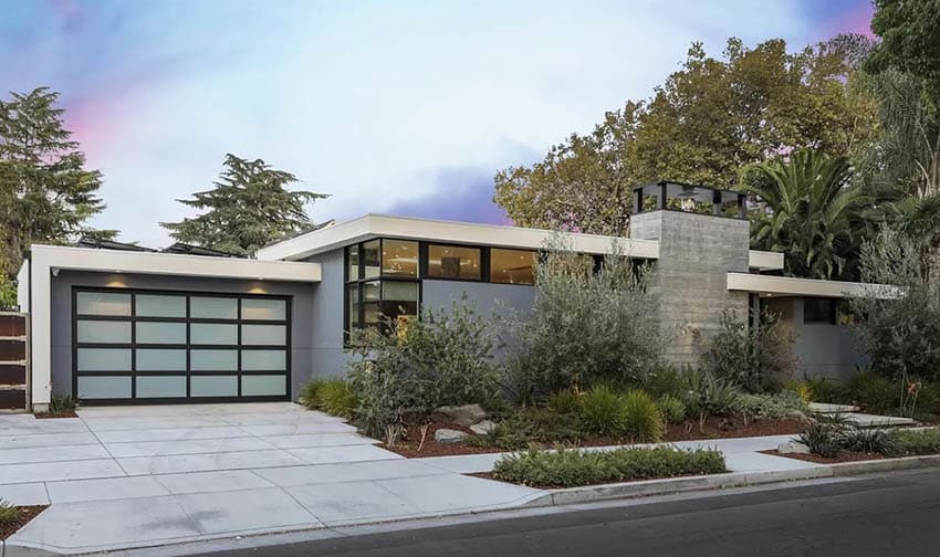 Modern house exterior with clerestory windows frosted glass garage door