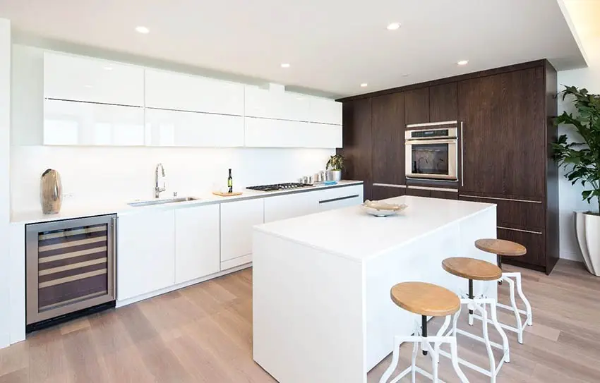 Modern kitchen with white and brown cabinets white caesarstone countertops