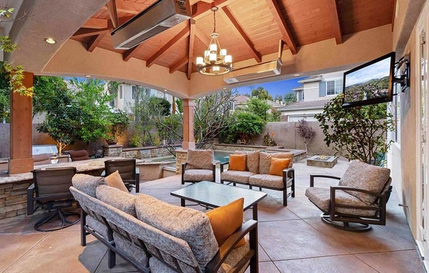 Tv outside under covered patio with outdoor furniture gas fire pit wading pool
