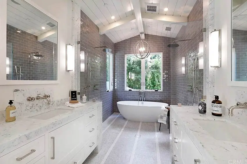 Beautiful master bathroom with freestanding tub and dual showers
