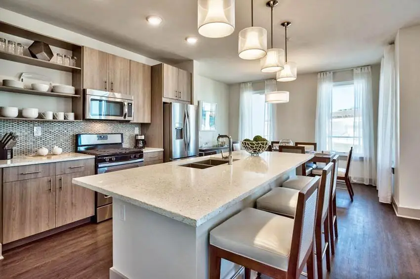 Kitchen with metal mosaic backsplash